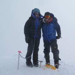 Nina H. on the summit of Denali 2018 wearing Forty Below Fresh Tracks overboots.