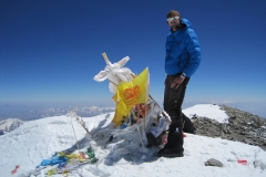 Christian Z. from Austria on top of Mustagh Ata with 40 Below Fresh Tracks overboots