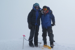 Nina H. on the summit of Denali 2018 wearing Forty Below Fresh Tracks overboots.