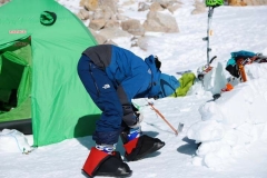 Tsugu wearing Fresh Tracks overboots over telemark boots on Denali 2018