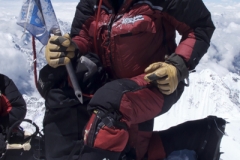 Mountain Guide Vern Tejas wearing Forty Below Purple Haze on Everest summit 2013. Photo by: JM Horst